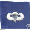 US Air Force Basic parachutist qualification wings, cloth, on blue